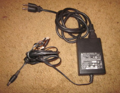 NEW DELTA ELECTRONICS ADP-15ZB B AC/DC Power Adapter 12V 1.25A Charger - Click Image to Close